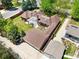 Bird's eye view of the home showcasing the backyard, mature landscaping, and driveway at 2500 Locust St, Denver, CO 80207