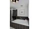 Contemporary bathroom features a large soaking tub and separate shower at 2500 Locust St, Denver, CO 80207