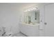 Bathroom with double vanity, white cabinets and plenty of counter space at 2500 Locust St, Denver, CO 80207