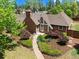 Beautiful brick home featuring a manicured front yard and charming stone walkway leading to the front door at 2500 Locust St, Denver, CO 80207