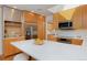 Bright kitchen with stainless steel appliances and a large white countertop island at 2500 Locust St, Denver, CO 80207