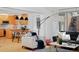 Bright living room with hardwood floors connected to an open kitchen and dining area at 2500 Locust St, Denver, CO 80207