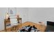 Functional office space featuring a desk, chair, and a fun decorative rug at 2500 Locust St, Denver, CO 80207
