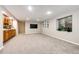 Finished basement provides a cozy space with a wet bar, and a wall-mounted TV creating a perfect entertainment area at 3802 Lee Cir, Wheat Ridge, CO 80033