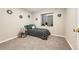 Finished bedroom with a comfortable bed, bright window, providing a cozy and inviting atmosphere at 3802 Lee Cir, Wheat Ridge, CO 80033