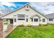 Charming exterior with well-maintained lawn and landscaping, offering curb appeal and a welcoming entrance at 3802 Lee Cir, Wheat Ridge, CO 80033