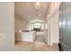 Inviting home foyer leading to a spacious living room with fireplace, offering a warm welcome at 3802 Lee Cir, Wheat Ridge, CO 80033