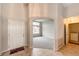 Welcoming foyer leads to living area, highlighting an open layout and convenient access to laundry at 3802 Lee Cir, Wheat Ridge, CO 80033