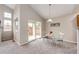 Living room and dining space featuring a glass sliding door to the outside patio at 3802 Lee Cir, Wheat Ridge, CO 80033