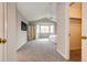 Spacious main bedroom featuring a walk-in closet and a sitting area by the bay window at 3802 Lee Cir, Wheat Ridge, CO 80033