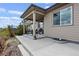 Spacious back patio with seating area and a grill at 3280 Youngheart Way, Castle Rock, CO 80109