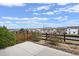 Landscaped backyard with a view of the neighborhood and distant mountains at 3280 Youngheart Way, Castle Rock, CO 80109