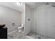 Basement bathroom with a large walk-in shower and tile flooring at 3280 Youngheart Way, Castle Rock, CO 80109