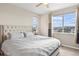 Spacious main bedroom with large window and mountain views at 3280 Young Heart Way, Castle Rock, CO 80109