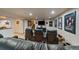 Basement entertainment space featuring theater seating, screen, and decorations at 9251 Sand Hill Trl, Highlands Ranch, CO 80126