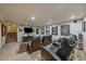 Basement entertainment space featuring theater seating, screen, and decorations at 9251 Sand Hill Trl, Highlands Ranch, CO 80126