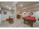 Finished basement featuring a recreation area with a pool table, bar, and seating at 9251 Sand Hill Trl, Highlands Ranch, CO 80126