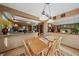 The dining area is conveniently near the kitchen and open to the living room, perfect for entertaining at 9251 Sand Hill Trl, Highlands Ranch, CO 80126