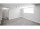 Finished basement featuring neutral paint, new carpet and fixtures, creating a versatile and inviting living space at 441 Elbert Way, Denver, CO 80221