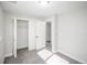 Sun-drenched bedroom with large closet, neutral paint, and new carpet, creating a welcoming and airy atmosphere at 441 Elbert Way, Denver, CO 80221