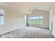 Bright bedroom featuring large windows with scenic views and plush carpeting at 812 Mulberry St, Louisville, CO 80027