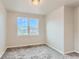 Bedroom with plush carpet, double window, and neutral paint at 812 Mulberry St, Louisville, CO 80027