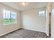 Bedroom showcasing a large window with views and neutral decor, offering a cozy retreat at 812 Mulberry St, Louisville, CO 80027
