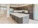 Spacious kitchen with a large island, stainless steel appliances, and stylish cabinetry for a modern feel at 812 Mulberry St, Louisville, CO 80027