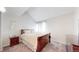 Bright bedroom boasts neutral walls, soft carpeting, and generous sunlight for a cozy and inviting atmosphere at 12368 W Nevada Pl # 303, Lakewood, CO 80228