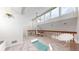 Cozy loft with bright natural lighting and neutral paint is the perfect bonus room at 12368 W Nevada Pl # 303, Lakewood, CO 80228