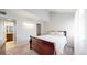 Spacious main bedroom with plush carpeting, white walls, and bathroom access offers a tranquil retreat at 12368 W Nevada Pl # 303, Lakewood, CO 80228