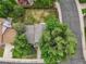 Aerial view of a home with a large backyard and mature trees, showcasing the property's layout at 298 S Hoover Ave, Louisville, CO 80027