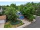 Beautiful two-story home nestled among mature trees, offering a peaceful and private setting at 298 S Hoover Ave, Louisville, CO 80027