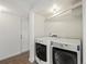 Laundry area featuring modern washer and dryer at 298 S Hoover Ave, Louisville, CO 80027