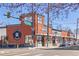 Street view of a local coffee shop Thump, with outdoor seating and a pedestrian crossing at 1175 N Emerson St # 308, Denver, CO 80218