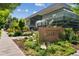 Entrance to the Denver Botanic Gardens featuring lush landscaping and modern architectural design at 1175 N Emerson St # 308, Denver, CO 80218