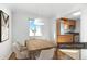 Bright dining room with a table and seating for six, connected to the kitchen at 1175 N Emerson St # 308, Denver, CO 80218