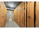 View of storage lockers in a basement with wooden doors and locks for added security at 1175 N Emerson St # 308, Denver, CO 80218