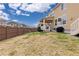 A spacious backyard featuring a well-maintained lawn at 14278 Forest St, Thornton, CO 80602