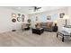 Upstairs bonus room featuring neutral paint, a dining table, and a comfortable seating area at 14278 Forest St, Thornton, CO 80602