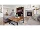 Cozy living room with fireplace, TV, and stylish decor at 14278 Forest St, Thornton, CO 80602