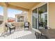 Covered patio with outdoor seating and a view of the neighborhood at 14278 Forest St, Thornton, CO 80602