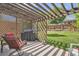 Outdoor patio with a pergola, grill, and wicker furniture, perfect for outdoor entertaining and relaxation at 4203 E 126Th Ave, Thornton, CO 80241