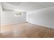 Finished basement area boasting laminate flooring, neutral walls, and bright natural light from a window at 6800 E Tennessee Ave # 541, Denver, CO 80224