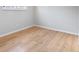 Bright bedroom showcasing wood-look floors and neutral walls at 6800 E Tennessee Ave # 541, Denver, CO 80224