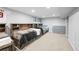Spacious bedroom featuring two beds, carpet, and built in storage at 11771 Elk Head Range Rd, Littleton, CO 80127