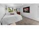 Spacious main bedroom offers natural light, neutral decor, and comfortable carpeting at 11771 Elk Head Range Rd, Littleton, CO 80127