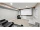 Spacious theater room, featuring large screen and comfortable seating at 11771 Elk Head Range Rd, Littleton, CO 80127