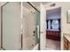 Bathroom with glass shower door at 12338 W Dorado Pl # 107, Littleton, CO 80127