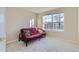 Bedroom includes a large window and carpeted floors at 12338 W Dorado Pl # 107, Littleton, CO 80127